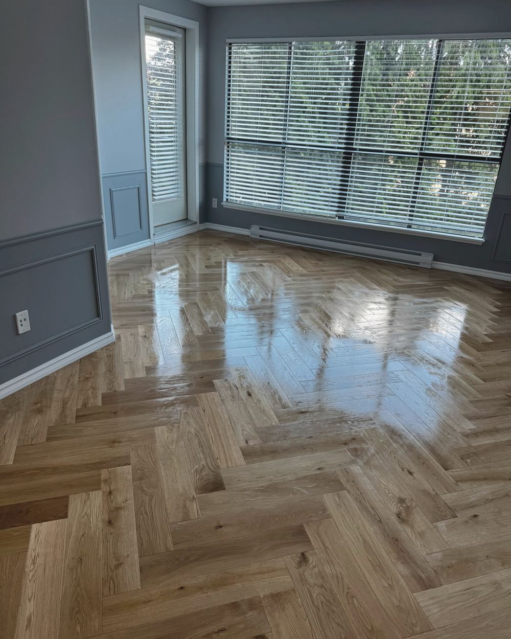 Finished herringbone hardwood floor in a Richmond living room